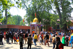Devotees surrounding the temple