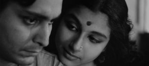 Soumitra Chatterjee with Sharmila Tagore in a scene from Apur Sansar.