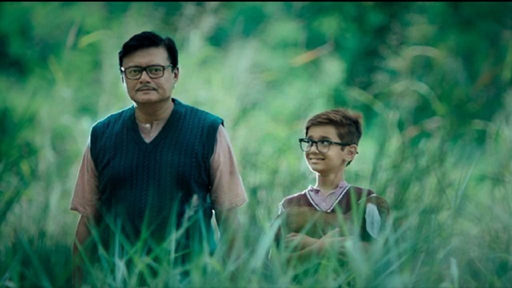 Saswata Chatterjee with young Jagga in a still from the film