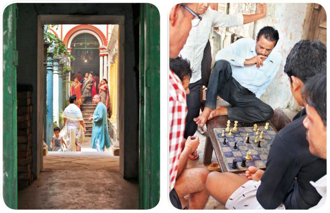 Kleine Eingänge mit langen Gängen verstecken öfter schöne Innenhöfe privater Häuser.Manche davon öffnen ihre Türen zur Feier Durga Puja, Feierlichkeiten, bei denen die bengalische Süße auf den Straßen. gezeigt wird, wie hier beim Schachspielen