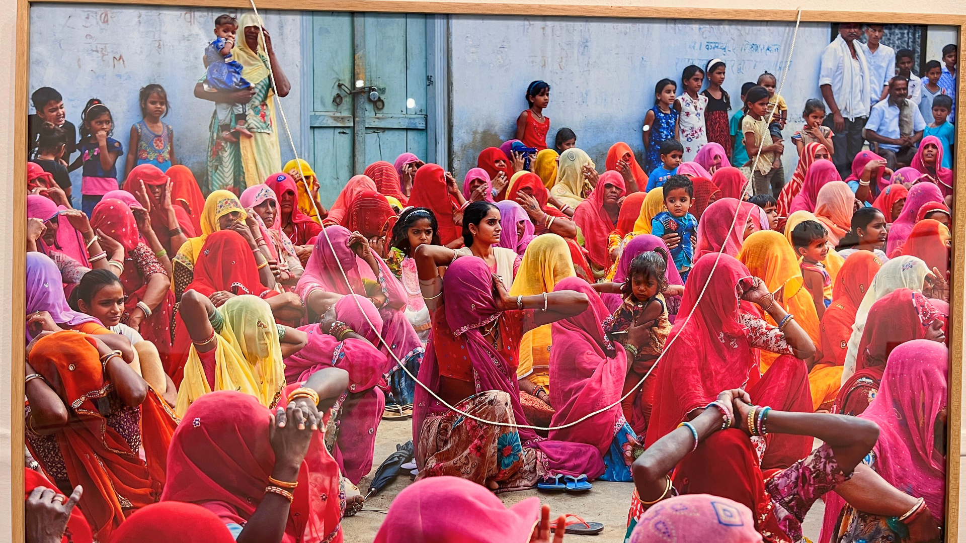 The communal scene illustrates both devotion and vibrant unity